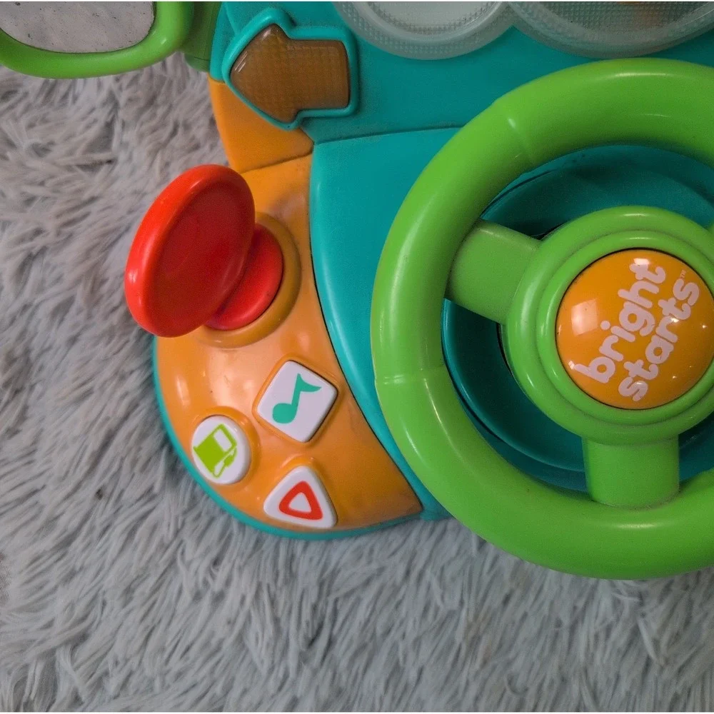 Bright Starts Lights & Colors Driver Light-Up Musical Baby Activity Toy Works